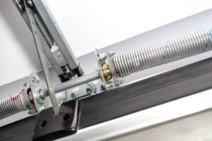 How to tension a garage door torsion spring