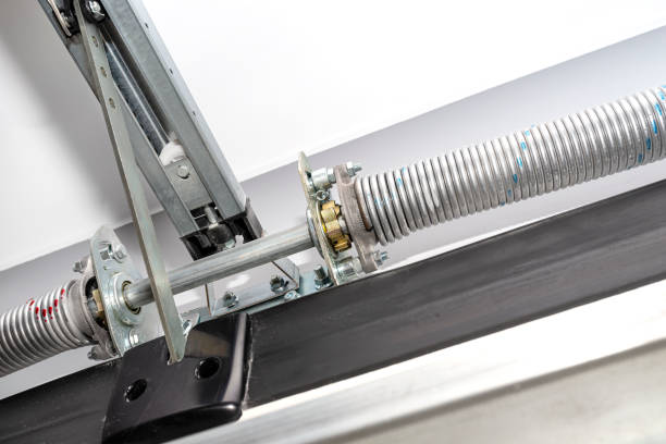 How to tension a garage door torsion spring