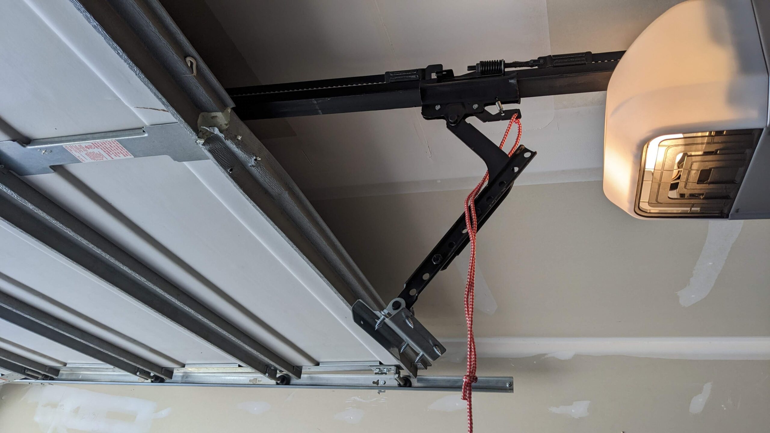 Emergency garage door bracket repair van service in Palatine Illinois